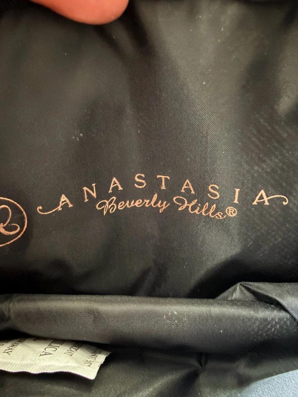 Anastasia Beverly Hills Black Patent Cosmetic Wristlet with Gold Bow